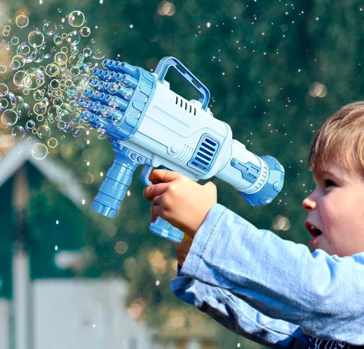 Electric bubble gun toy for kids creating bubbles during outdoor play
